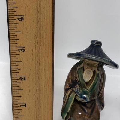 151:  Three Vintage Chinese Mud Men