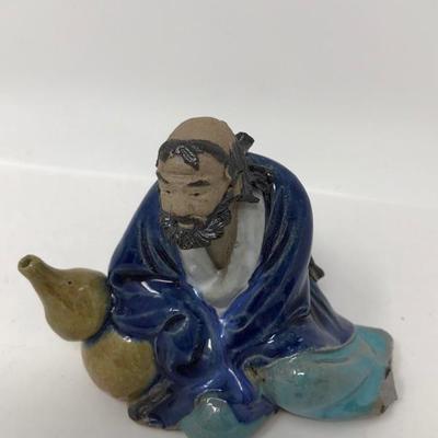 157:  Three Vintage Chinese Mud Men