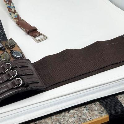 184: Assorted Belts Includes a Hand Made Polished Stone Buckle 