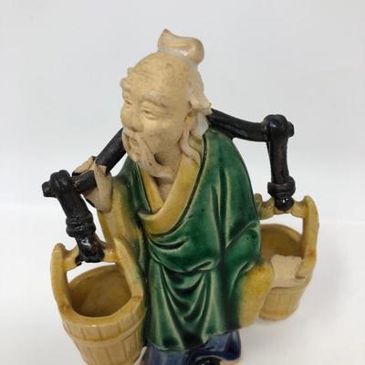 152:   Three Vintage Chinese Mud Men