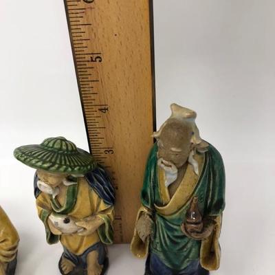 161:  Three Vintage Chinese Mud Men