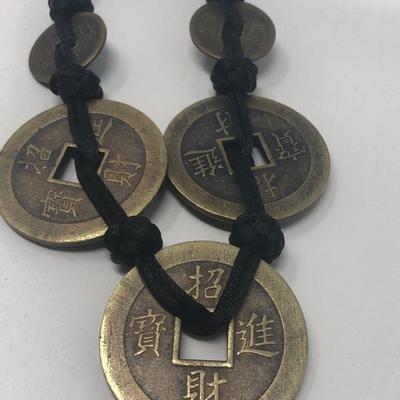 172:  Five Brass Chinese Coin Necklace on Kotted Black Cloth Strand