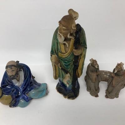 157:  Three Vintage Chinese Mud Men