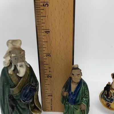155:  Three Vintage Chinese Mud Men