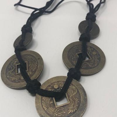 172:  Five Brass Chinese Coin Necklace on Kotted Black Cloth Strand