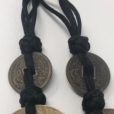 172:  Five Brass Chinese Coin Necklace on Kotted Black Cloth Strand