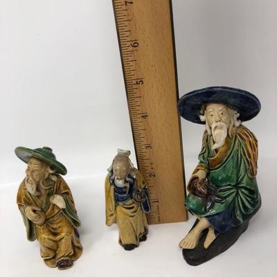 154:  Three Vintage Chinese Mud Men