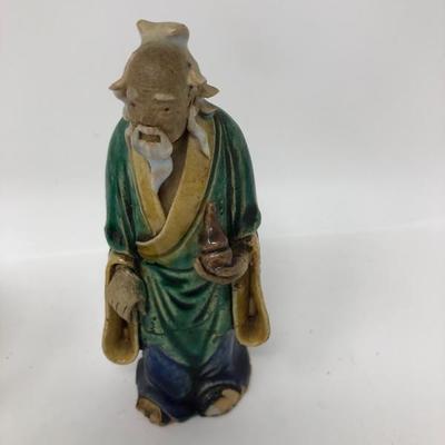 161:  Three Vintage Chinese Mud Men