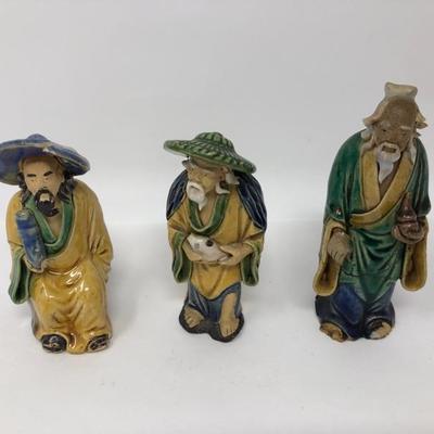 161:  Three Vintage Chinese Mud Men