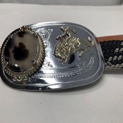 188: Assorted Belts Includes a Hand Made Polished Stone Buckle 