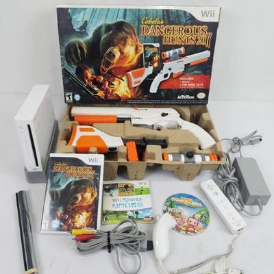 Wii Cabela's Dangerous Hunts 2011 with Wii & Controller. Tested, Works