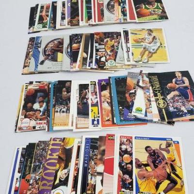 Lot #31: 100 NBA Basketball Cards, First Card is Byron Houston