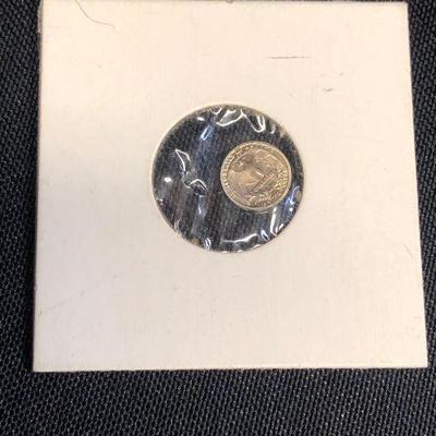 Lot 48 - Tiny Quarter from Continental Back Promo - 1/4 inch across