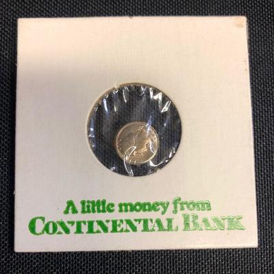 Lot 48 - Tiny Quarter from Continental Back Promo - 1/4 inch across