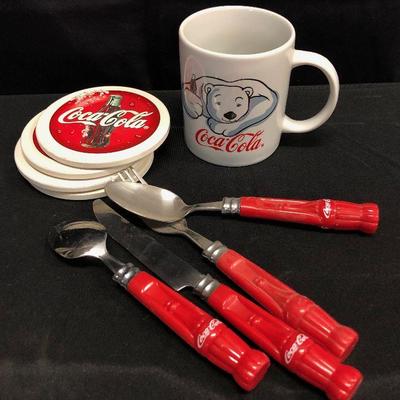 LOT 81 - COCA-COLA COLLECTIBLES: Coasters, cup, utensils