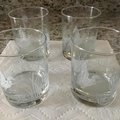 Four etched duck and reeds glasses