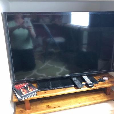 127:  Samsung Flat Screen With Wood Stand 