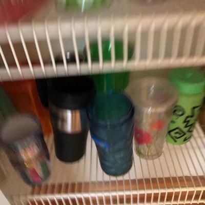 124:  Several Travel Mugs and Cups 