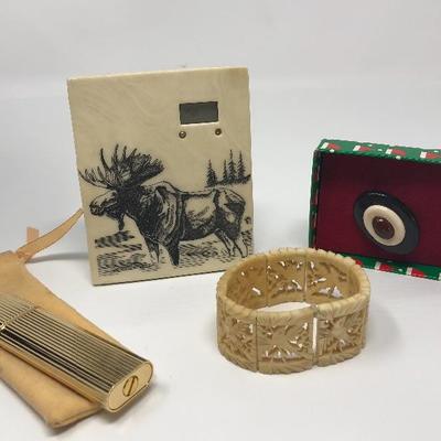 067:  Moose Stone Digital Clock, Bakelite Pin and Bracelet.  