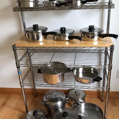 099:  Bakers Rack Full of Luster Craft Pots 