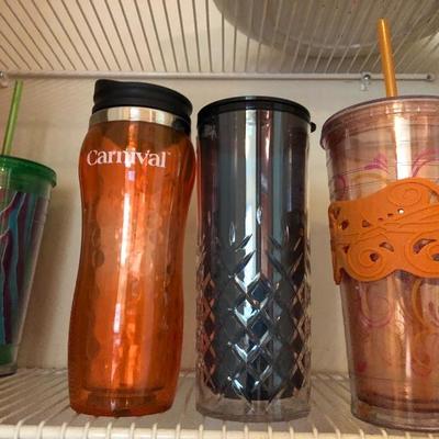 124:  Several Travel Mugs and Cups 