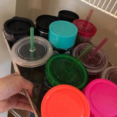 124:  Several Travel Mugs and Cups 