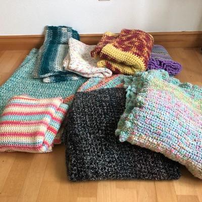 092: An Assortment Of Finished Afghans 