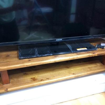 127:  Samsung Flat Screen With Wood Stand 