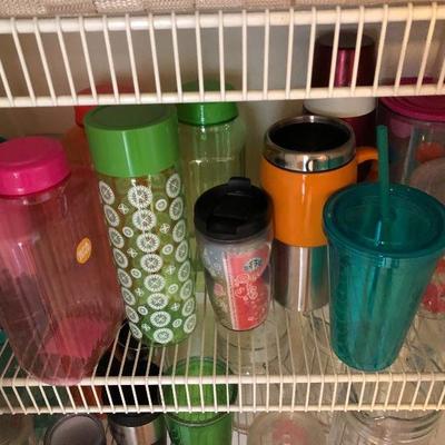 124:  Several Travel Mugs and Cups 