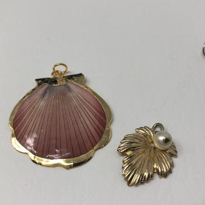083:  Gold Tone Pendants, Necklaces and Earrings