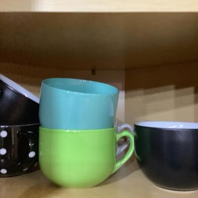 213: Assorted dishes in the cupboard