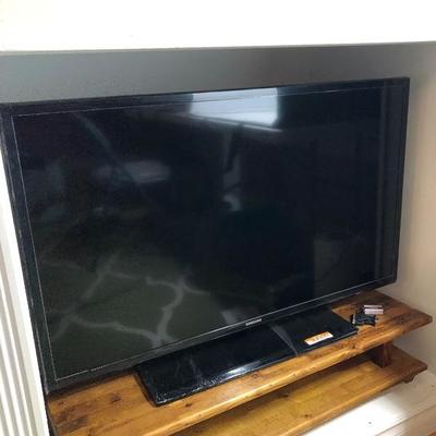 127:  Samsung Flat Screen With Wood Stand 