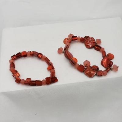 Red shell and rock bracelets