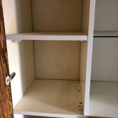 Lot #78 Tall Melamine Cupboard with doors and Glass shelf