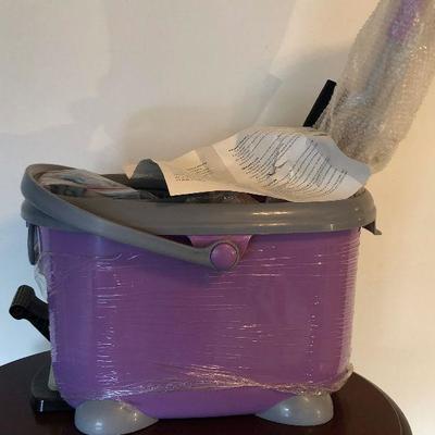 Lot #54 Double spin mop and bucket 