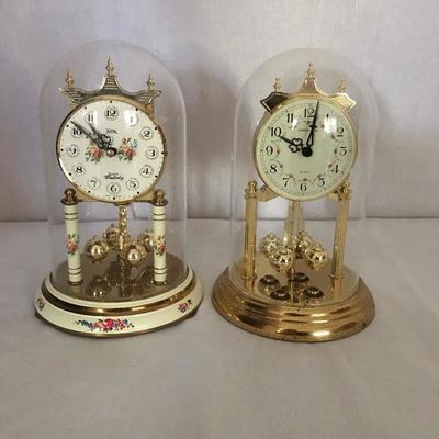 Lot 3 - Pair of Quartz Globe Clocks