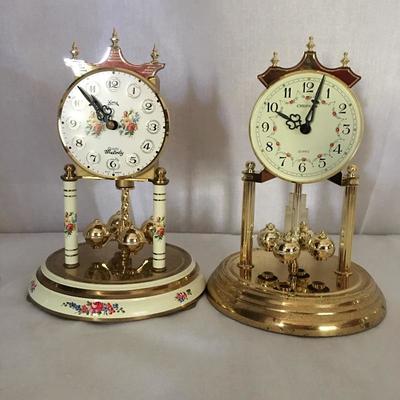Lot 3 - Pair of Quartz Globe Clocks