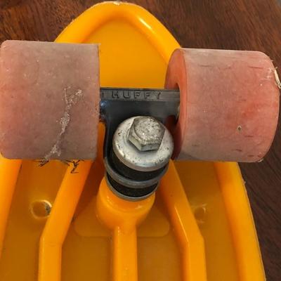 234:  Orange Huffy Hunder Skate Board 24 Action Tail 