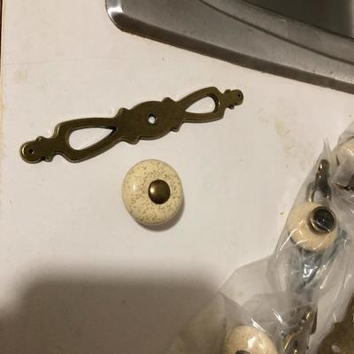 241:  Gold Tone and Porcelain Drawer Pulls