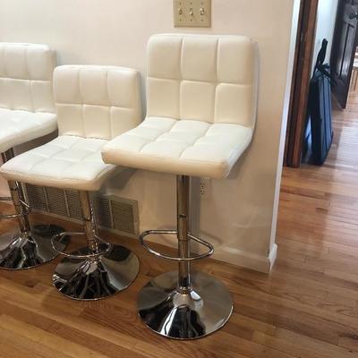038: Four Like New Adjustable Vinyl Bar Stools 