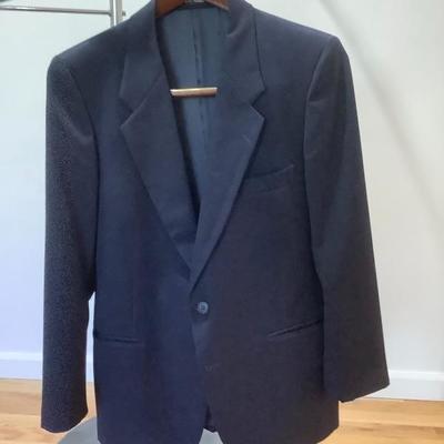 100:  Men's Suits and Spiral Clothing Rack