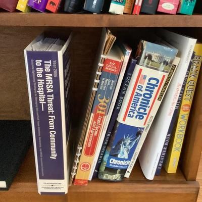 113: Bookshelf with books and plants