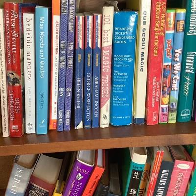 113: Bookshelf with books and plants