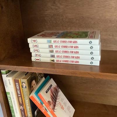 113: Bookshelf with books and plants