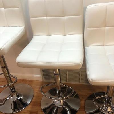 038: Four Like New Adjustable Vinyl Bar Stools 