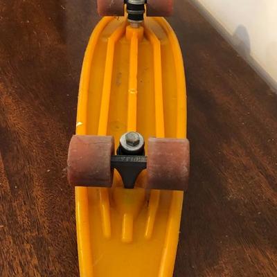 234:  Orange Huffy Hunder Skate Board 24 Action Tail 