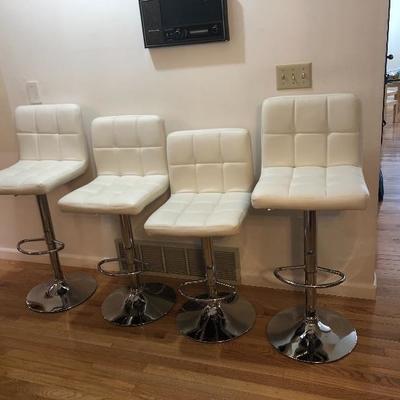 038: Four Like New Adjustable Vinyl Bar Stools 