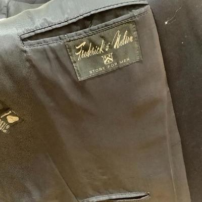 100:  Men's Suits and Spiral Clothing Rack