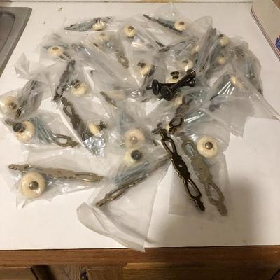 241:  Gold Tone and Porcelain Drawer Pulls