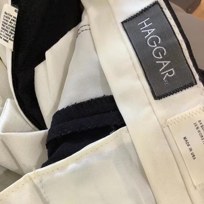 100:  Men's Suits and Spiral Clothing Rack